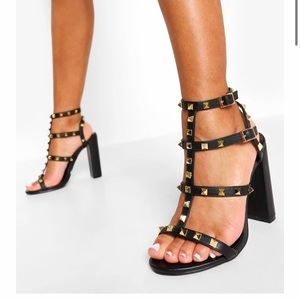 Black studded heels.